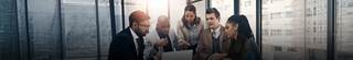 Group of tax professionals discussing a complex issue.
