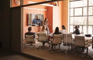 People sitting in a conference room in a meeting