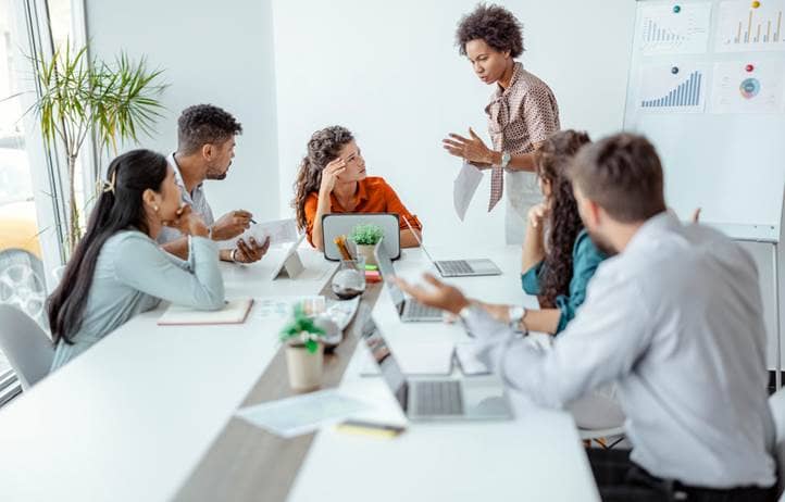 Group of tax professionals in a meeting.