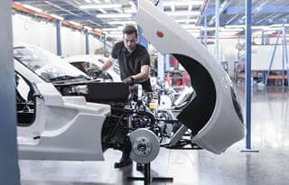 Factory worker in an automotive factory.