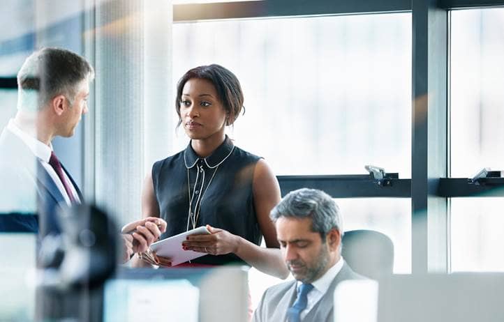 Business professionals in a modern office.