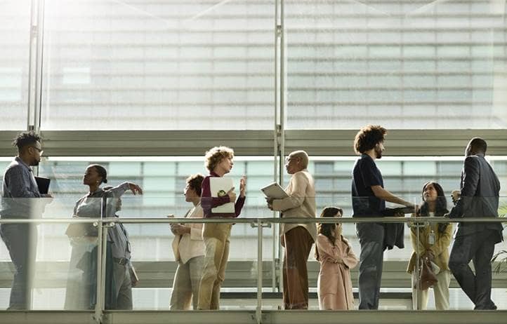 Group of business professionals talking.