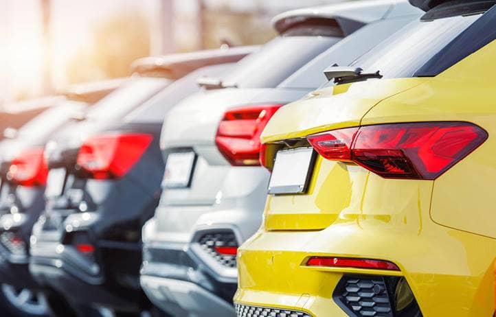 Cars in a parking lot.