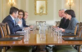 Federal contractors meeting to discuss SCIF spaces.