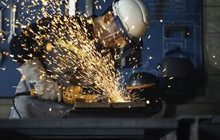 Manufacturer working in a factory.