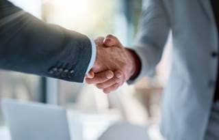 Shaking hands.