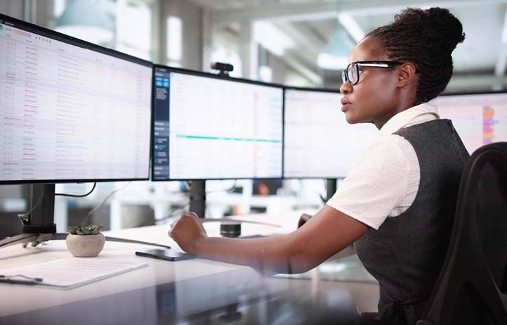 Banking professional working on their computers.