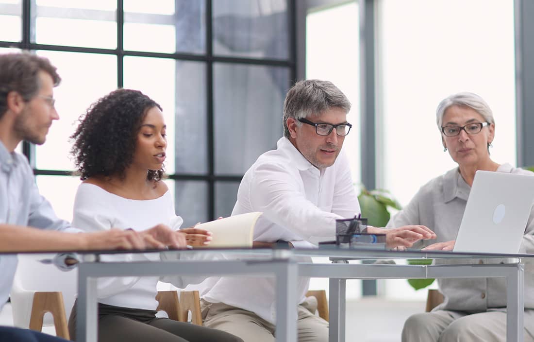 Group of tax professionals in a meeting.
