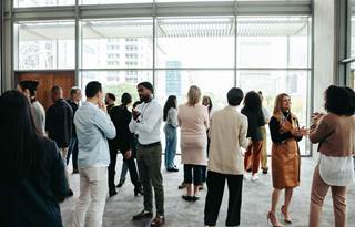 International business professionals milling around.