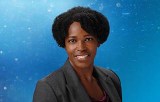 Professional photo of Felicia Donaldson in front of a blue gradient background.