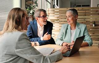 A real estate asset manager helping with financial advisory for clients