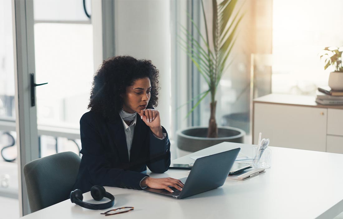 Woman looking at a computer screen.